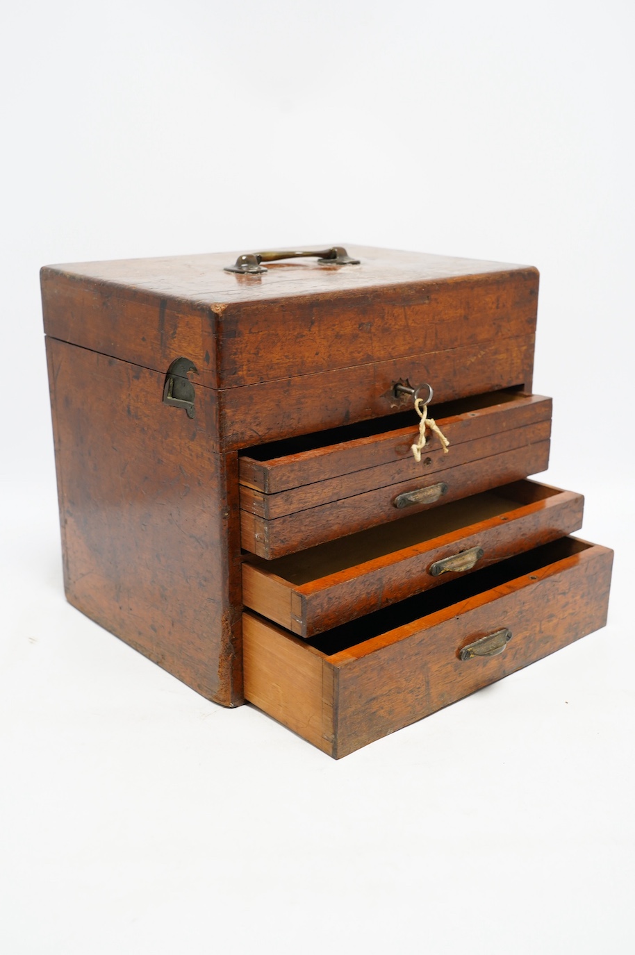 A Victorian circular mahogany solitaire board, 30cm diameter, together with a Victorian mahogany instrument box, 26cm high. Condition - fair
